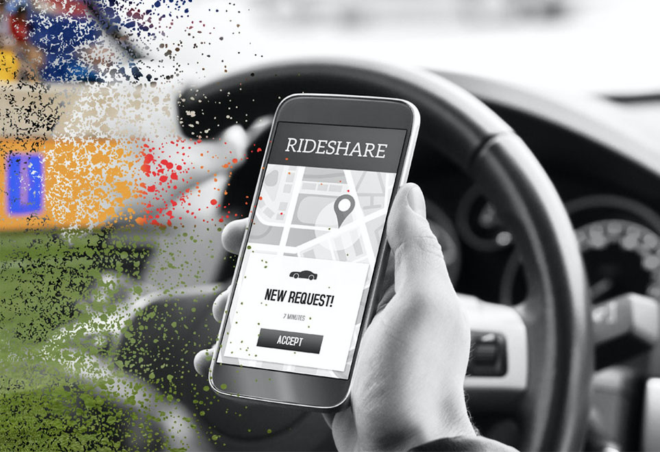 rideshare hand holding a mobile phone with the RideShare app displayed
